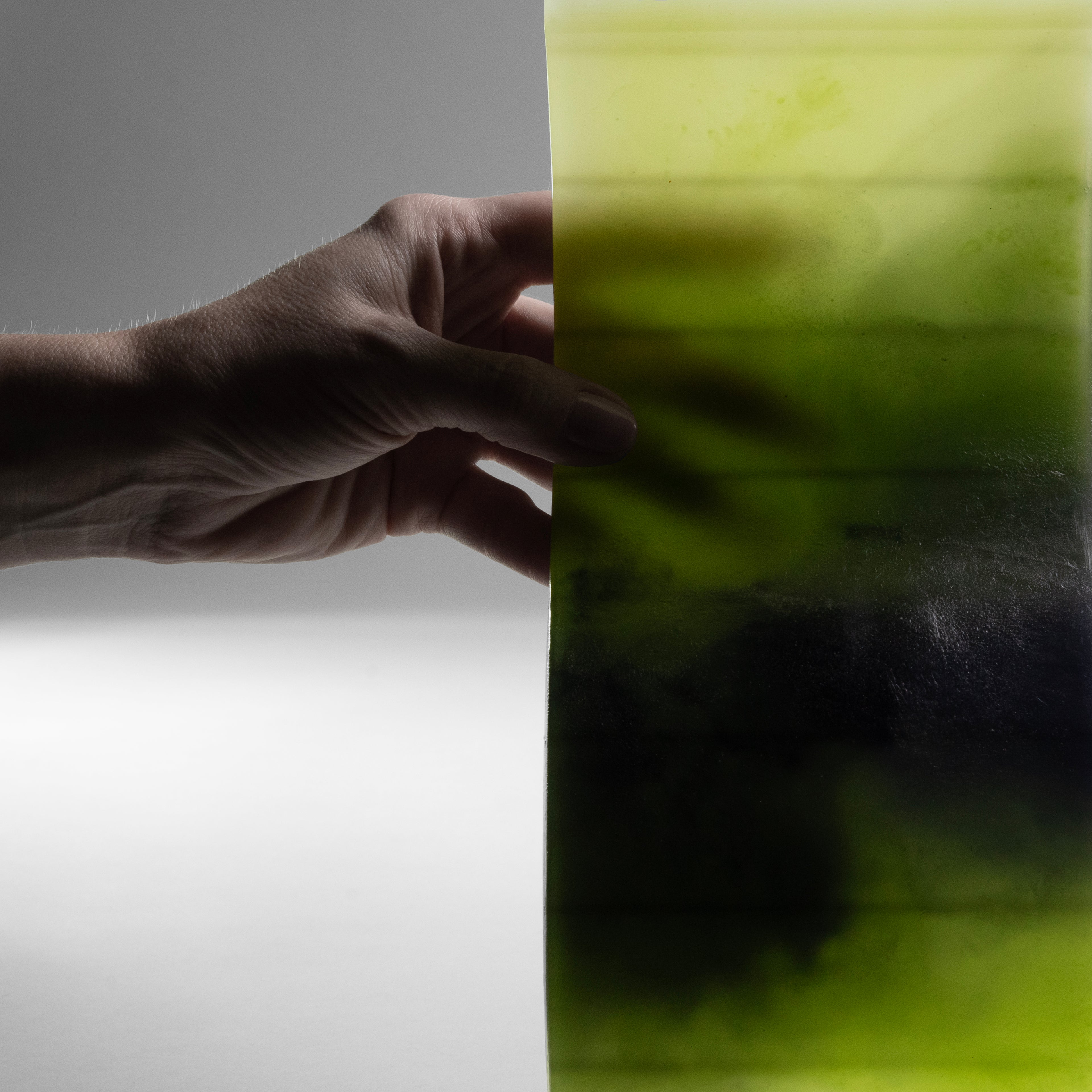 Pigmented wax detail of FORESTA forest green decorative candle