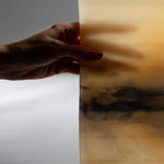 Hand-poured wax detail of DUNE designer candle in neutral beige tones