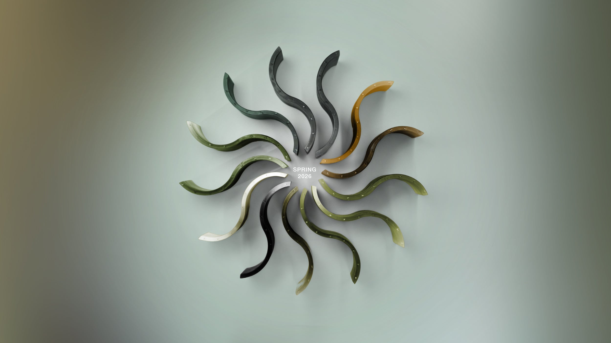 Radial arrangement of sculptural wax candle objects in natural sage and stone tones — ESCLUSSO Studio Editions.